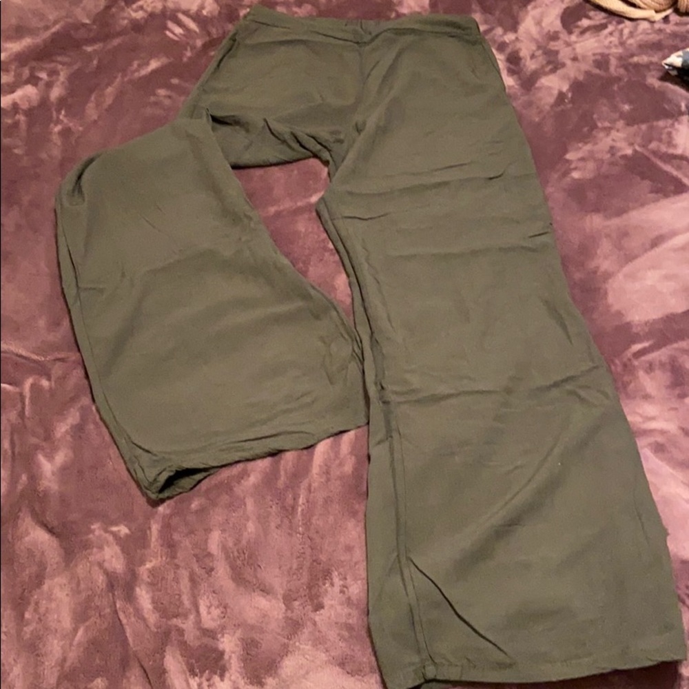 Very wide legs, green pants, medium size